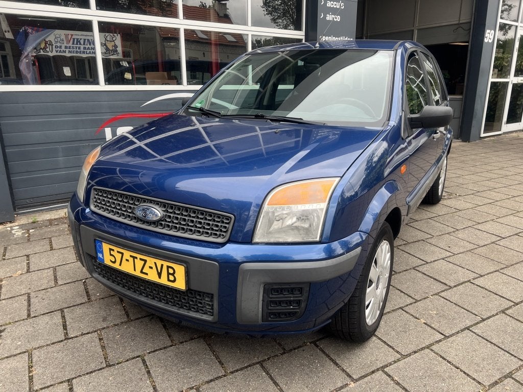 Ford Fusion 1.4-16V Champion Airco 5 deurs (bj 2007), Auto's, Ford, Gebruikt, Blauw, 49 €/maand, Origineel Nederlands