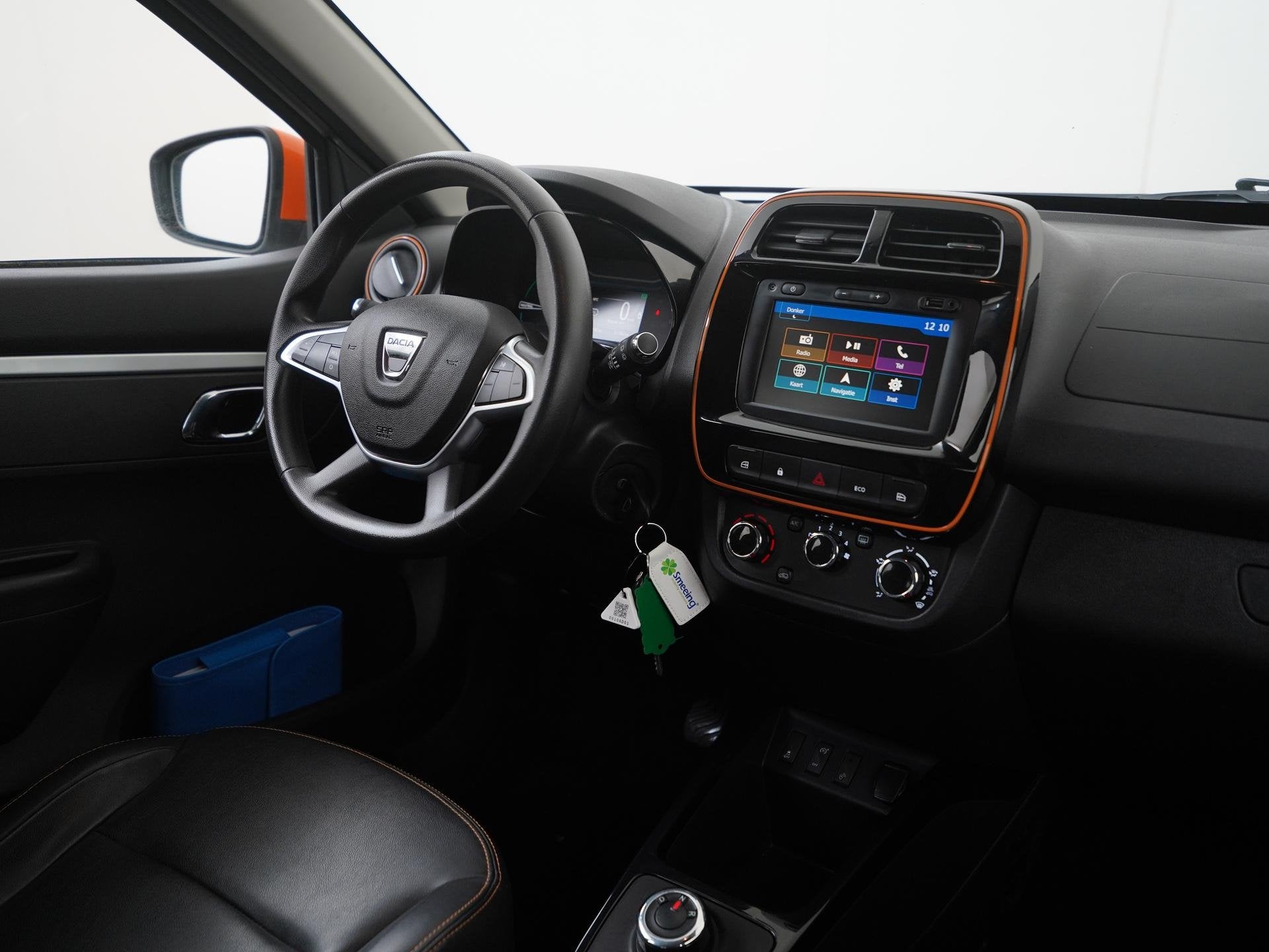 Dacia Spring Comfort Plus 27 kWh (Orange Pack) | SOH 91% | C, Auto's, 12 maanden, Parkeercamera, Gebruikt, 4 stoelen