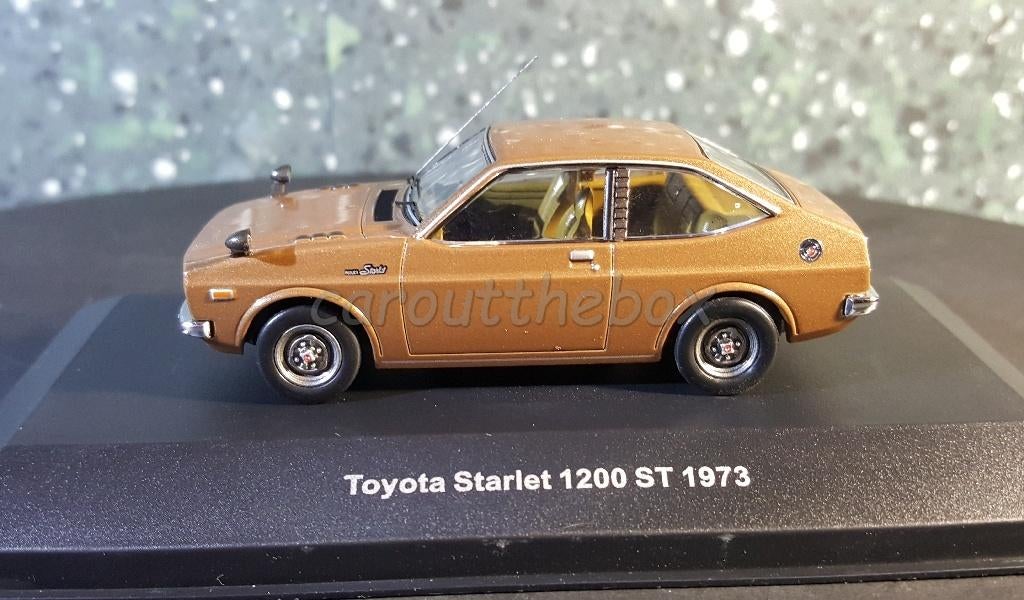 Toyota Starlet 1200 ST 1973 bruin 1:43 Ixo V294, Hobby en Vrije tijd, Modelauto's | 1:43, Verzenden, Nieuw, Auto, Overige merken