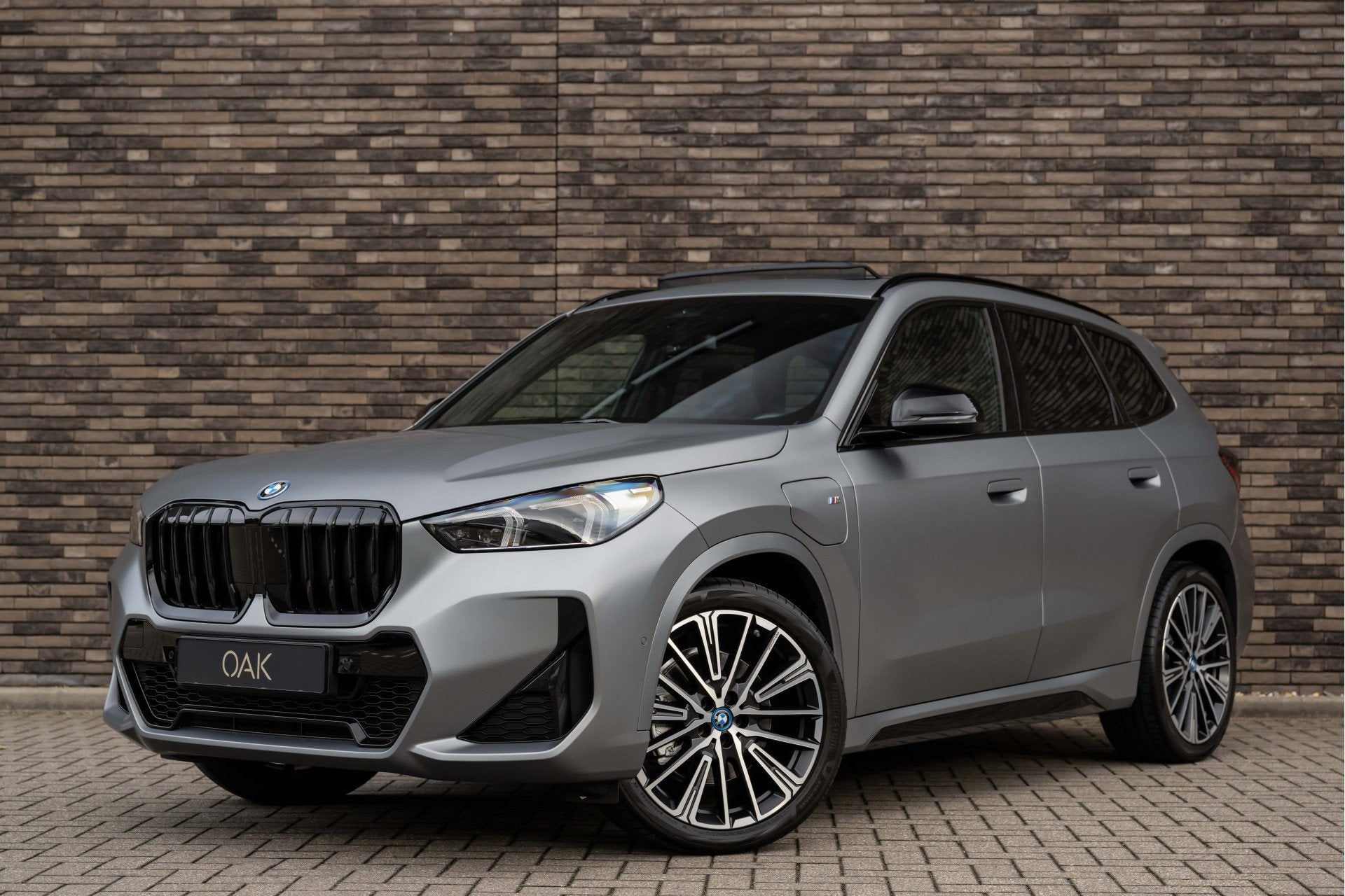 BMW X1 xDrive30e | M-Sport | Live Cockpit | Panorama | Leder, Auto's, Gebruikt, Zwart, Bedrijf, Hybride Elektrisch/Benzine