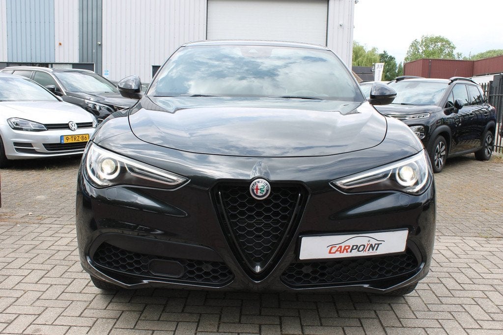 Alfa Romeo Stelvio 2.0 T AWD Q4 Leer Navi Blindspot Memory L, Auto's, Alfa Romeo, Automaat, Zwart, 4 cilinders, Automatische klimaatregeling
