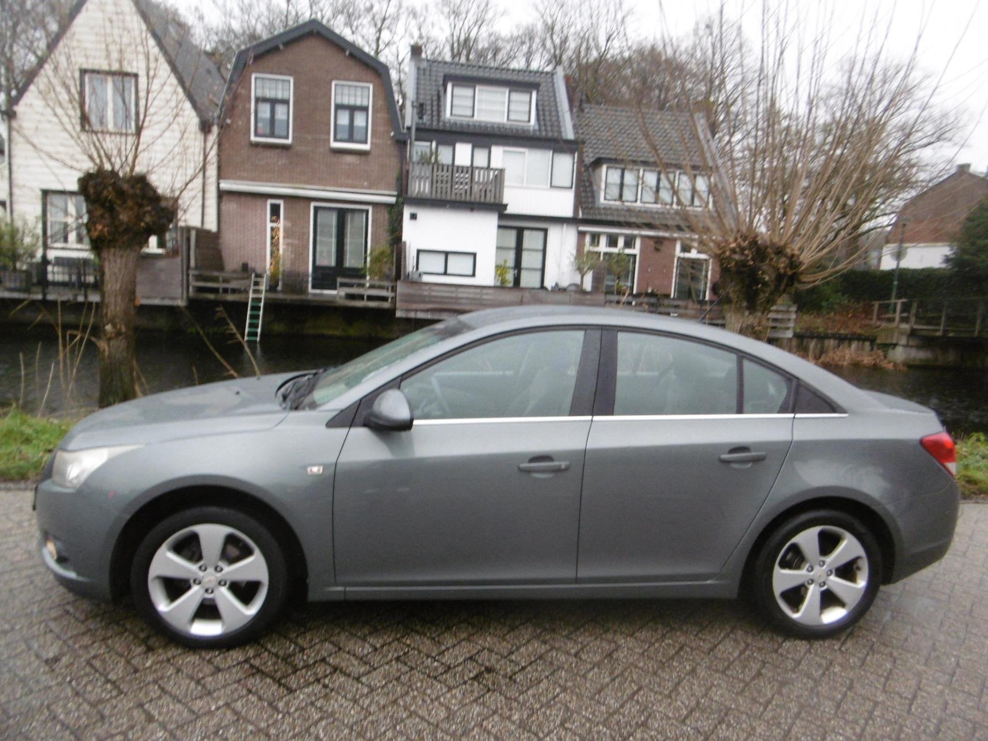 Chevrolet Cruze 1.8 LT 141pk Clima Cruise Motor heeft koelpr, Auto's, Voorwielaandrijving, Euro 5, Gebruikt, 4 cilinders