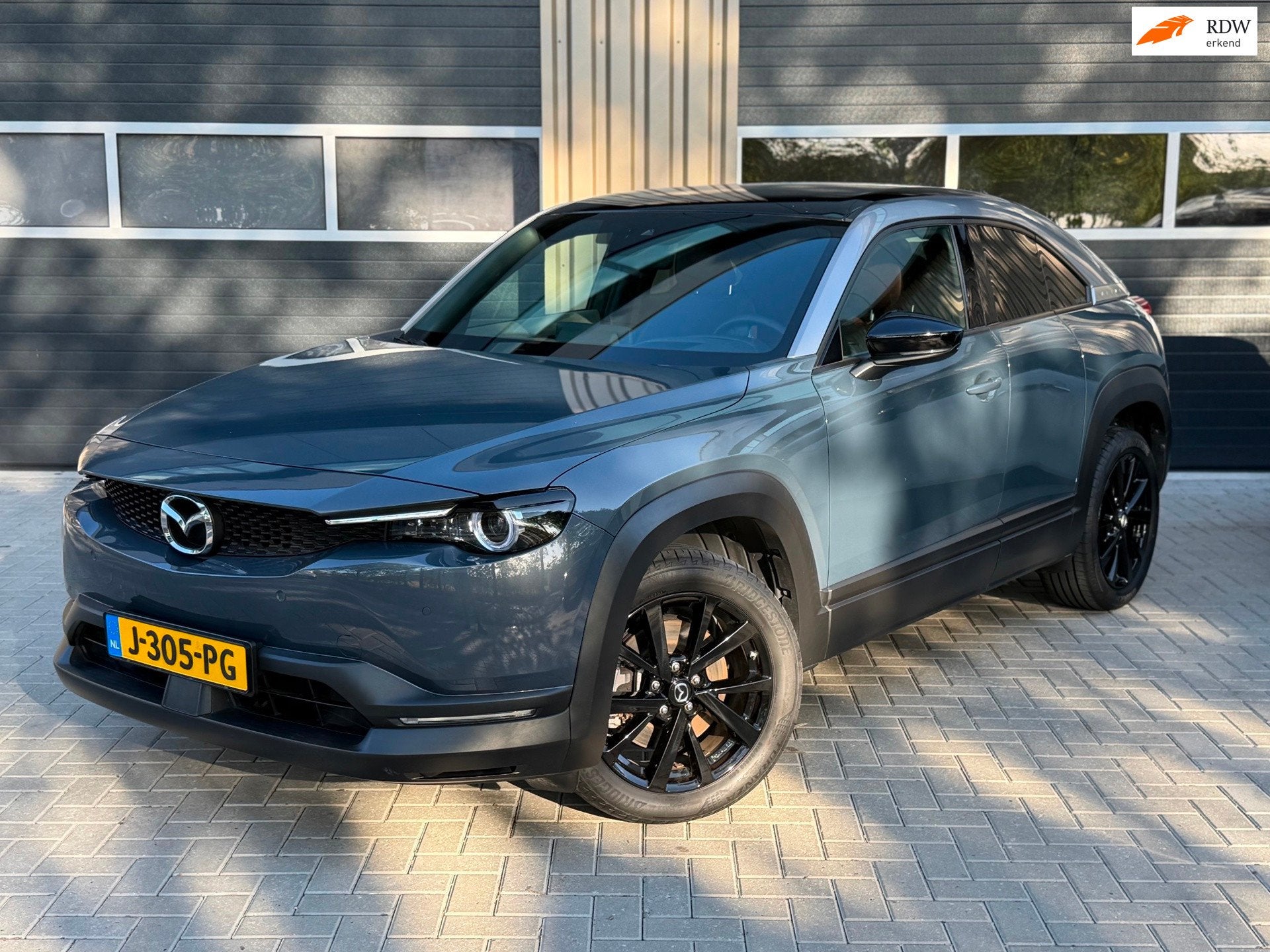 Mazda MX-30 E-SkyActiv 145 First Edition 36 kWh | SOH 95,88%, 145 pk, Gebruikt, Zwart, 35 kWh