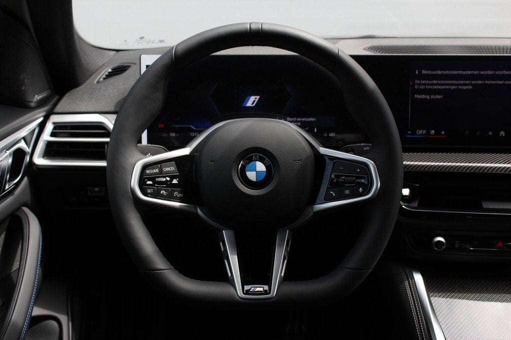 BMW i4 eDrive40 M Sport / M Sportstoelen / Achteruitrijcamer, Auto's, BMW, Achterwielaandrijving, Met garantie (alle), Blauw, 2020 kg