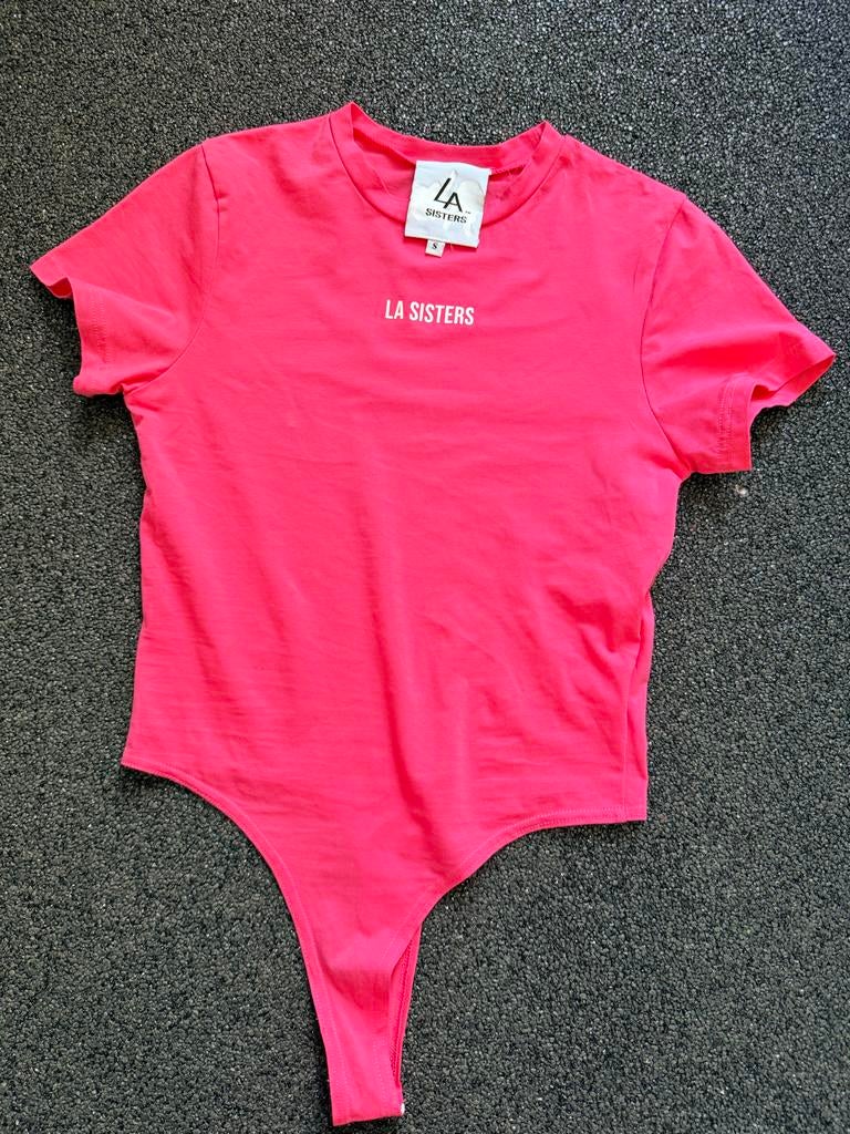 LA Sisters roze bodysuit met korte mouwen maat s, Ophalen of Verzenden, Zo goed als nieuw, Korte mouw, Roze