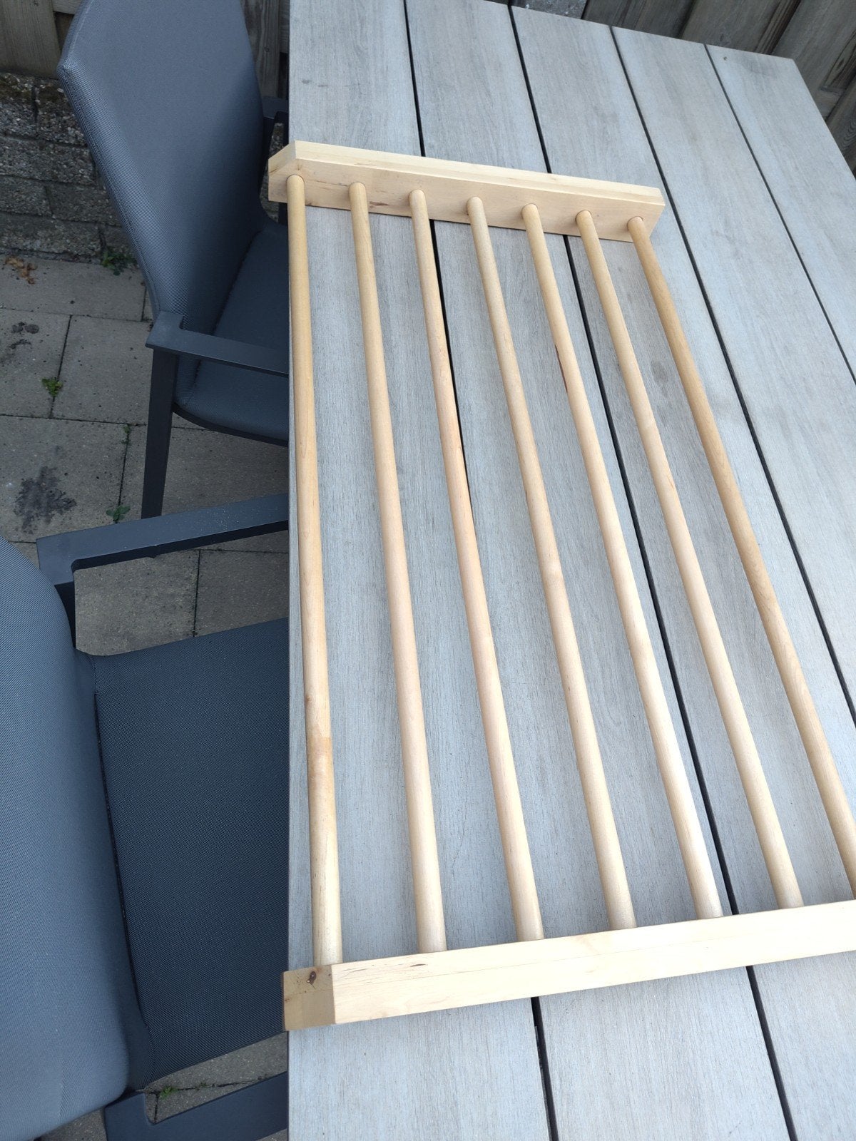 Houten kleding ophangrek voor Ikea kast, Ophalen