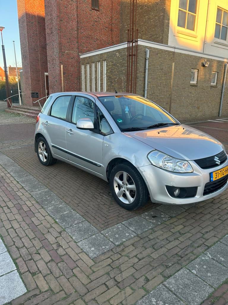 Suzuki SX4 1.6 2006 Grijs, Voorwielaandrijving, Zwart, 4 cilinders, 49 €/maand