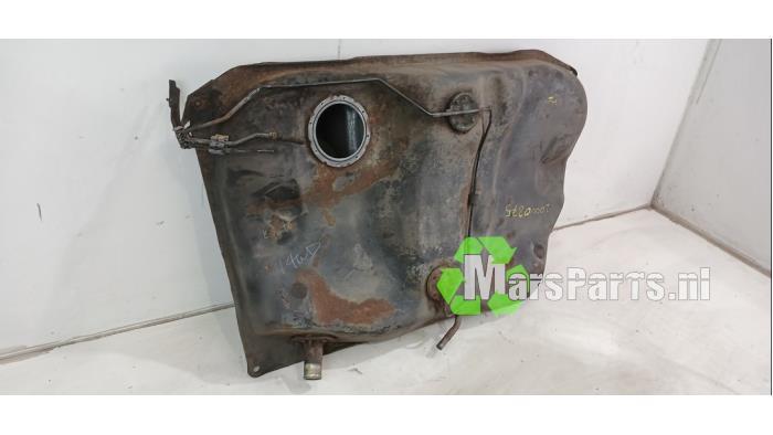 Foto 3 van Tank van een Toyota Corolla