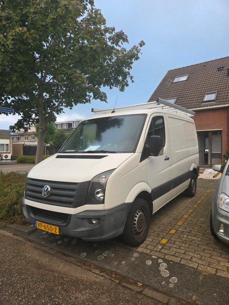 Volkswagen Crafter 2.0 TDI L1H1 bedrijfswagen met imperiaal, 13 km/l, Euro 5, Zwart, 4 cilinders