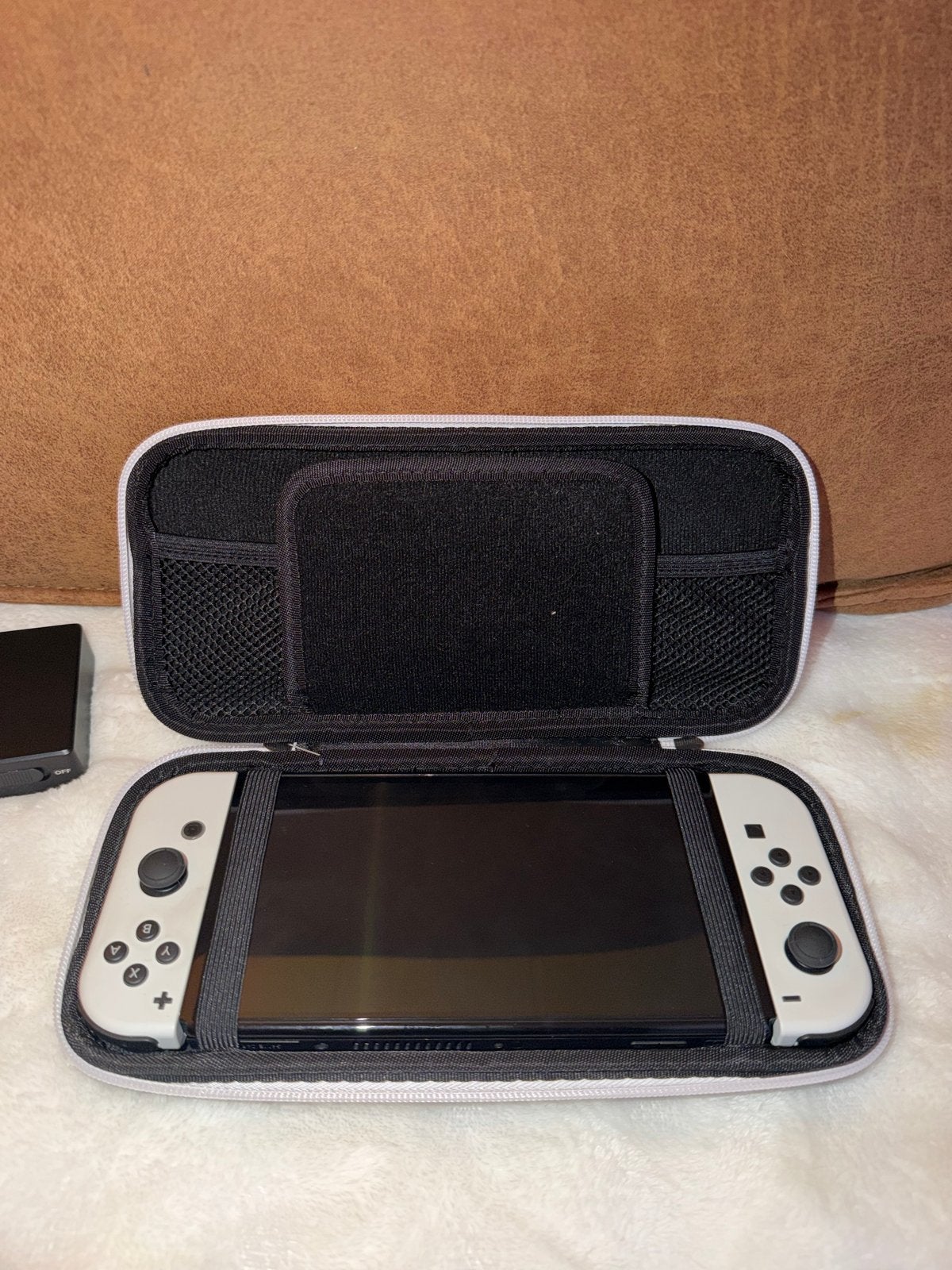 Nintendo Switch OLED met 3 games en accessoires