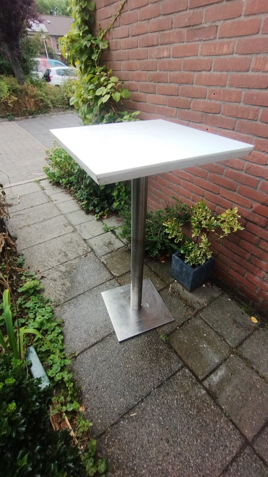 Gebruikte statafel met wit blad en RVS poot, Ophalen, Gebruikt