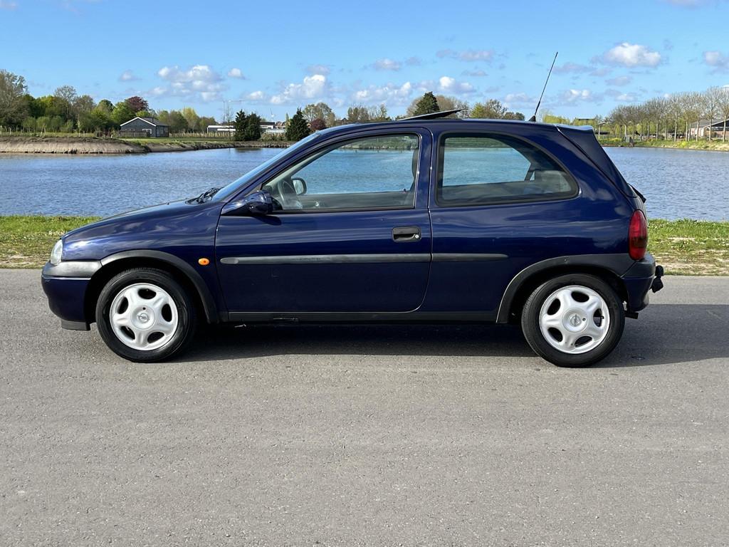 Opel Corsa 1.2i-16V Strada Cool Schuifdak, met nieuwe APK!, Auto's, Opel, Gebruikt, 31 €/maand, Blauw, Origineel Nederlands