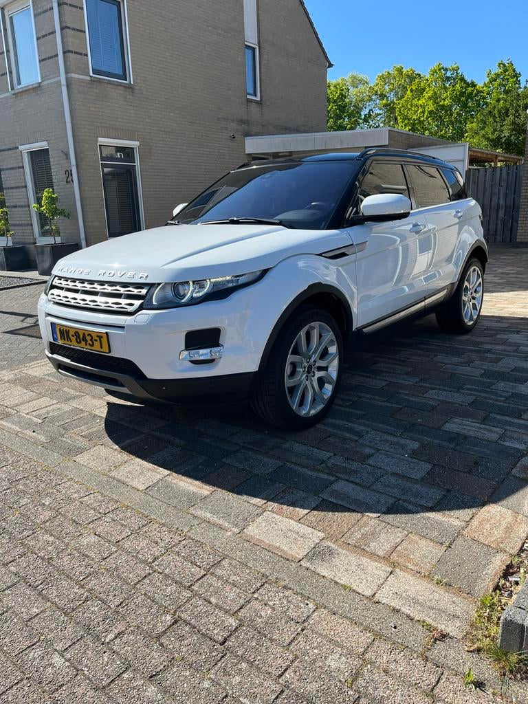Land Rover Range Rover Evoque SI4 4WD AUT 2011 Wit, Automaat, 1800 kg, Zwart, 4 cilinders