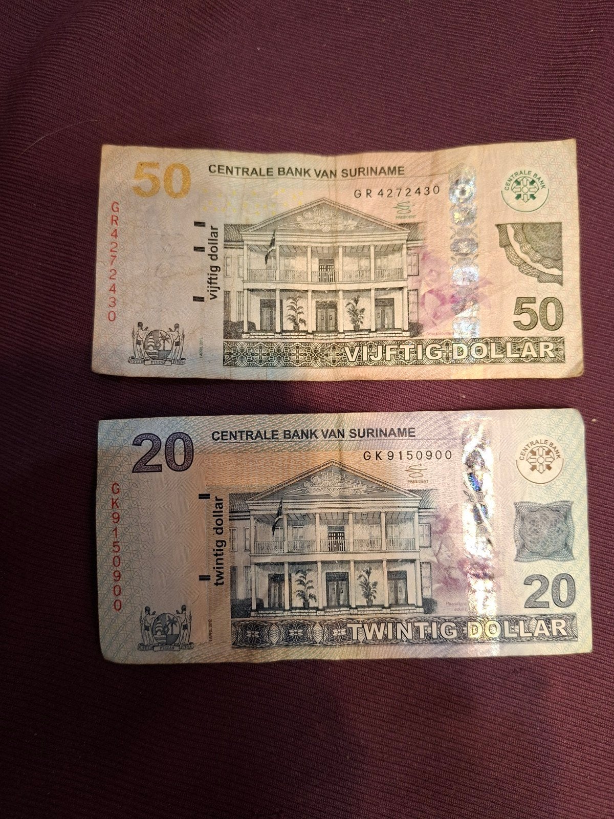 2 Surinaamse dollar biljetten: 20 en 50 dollar, Ophalen of Verzenden