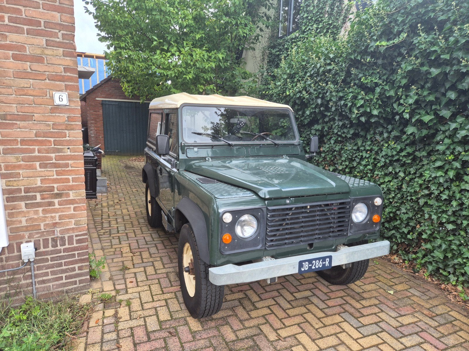 Land Rover (Defender) 90 Benzine 1986, Auto's, Zwart, 4 cilinders, 2495 cc, 100 pk
