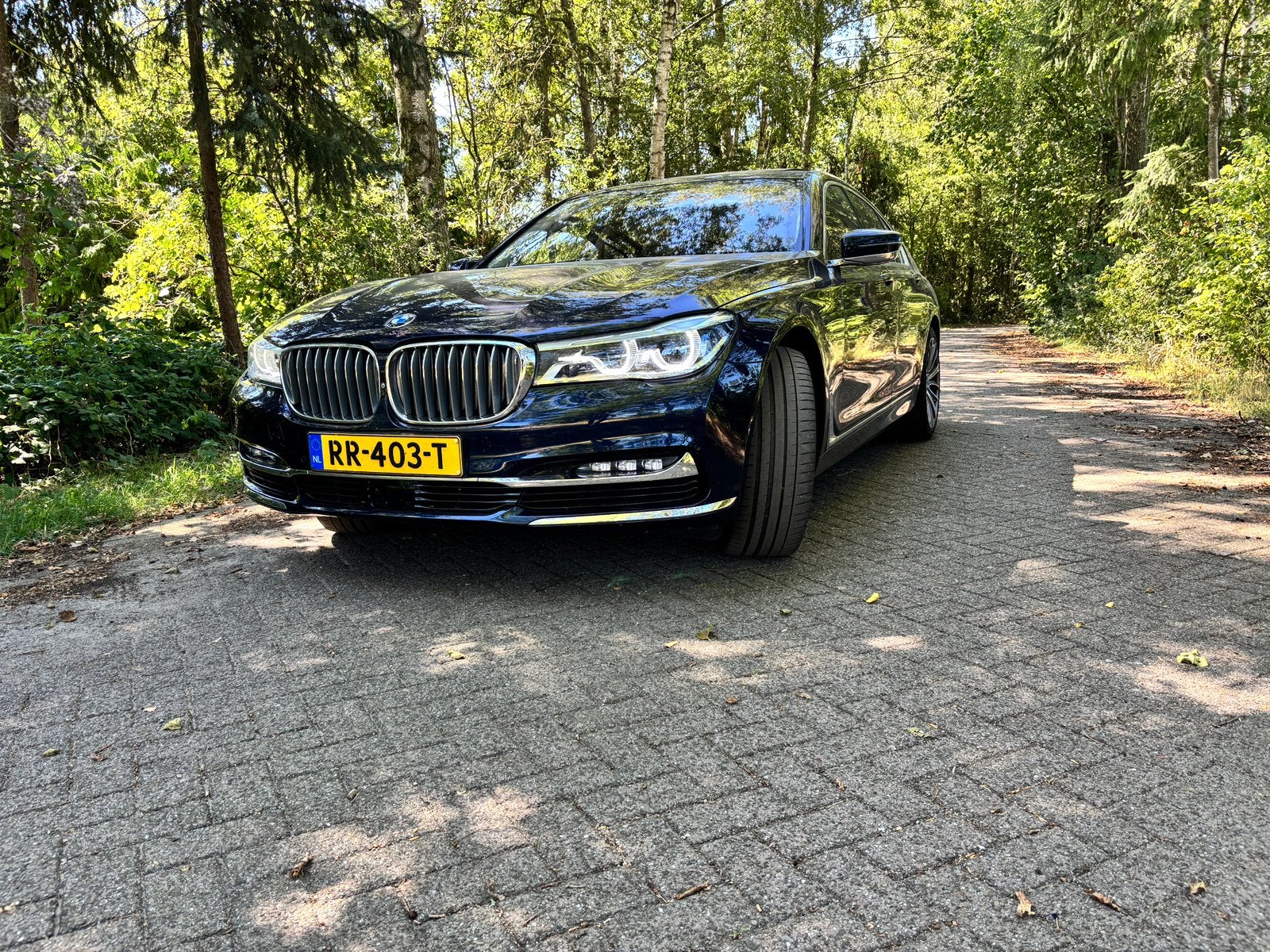 BMW 7-Serie 4.4 750I Xdrive AUT 2015 Blauw 84400km!!!, Auto's, BMW, Automaat, Leder, Bruin, Vierwielaandrijving