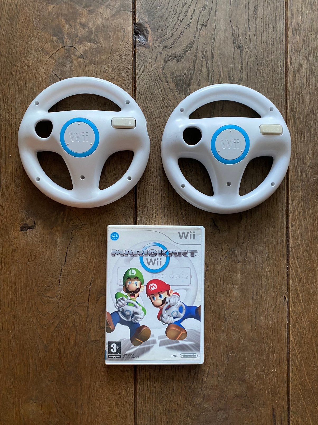Mario Kart Wii + 2 originele stuurtjes, Ophalen of Verzenden, Zo goed als nieuw