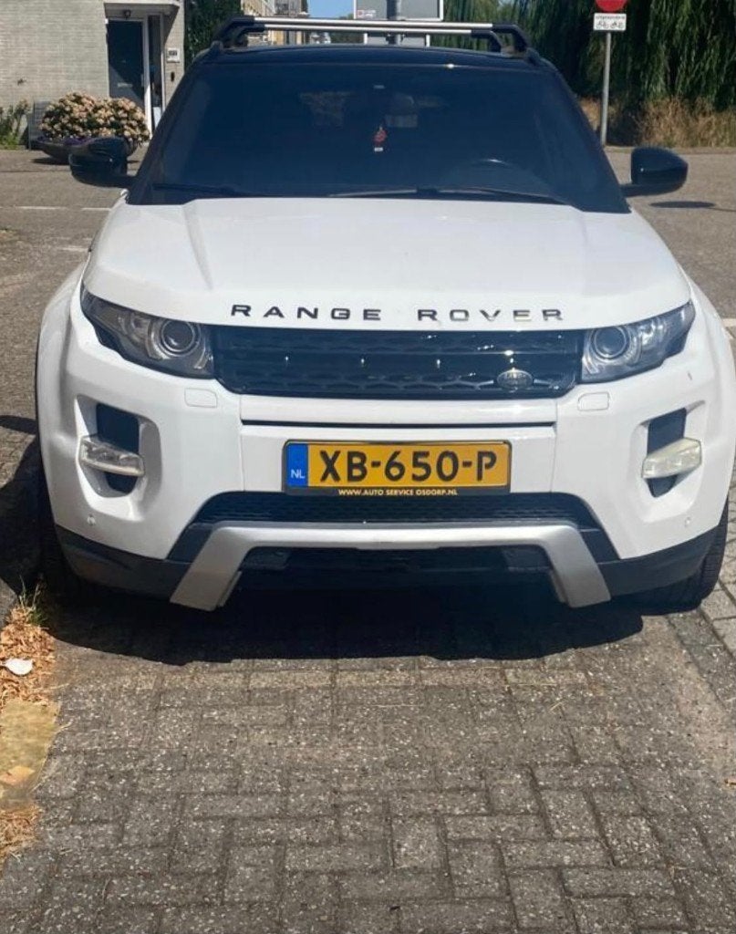 Land Rover Range Rover Evoque 2.2 SD4 4WD AUT 2014 Wit, Auto's, Automaat, 1800 kg, Zwart, Wit