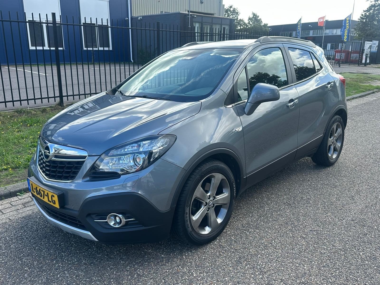 Opel Mokka 1.4 Turbo 16V 103KW Aut6 2014 Grijs, Auto's, 15 km/l, Leder en Stof, SUV of Terreinwagen, Mokka