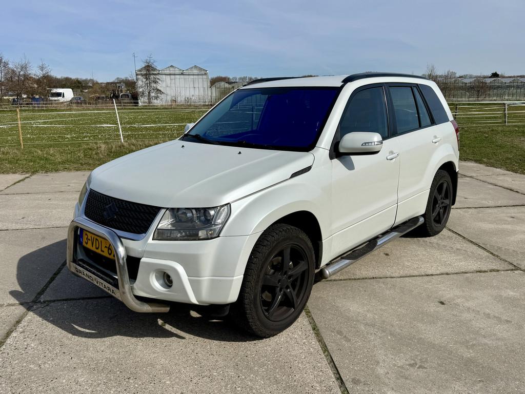 Suzuki Grand Vitara 1.9 4x4 airco leder cruise control trekh, 13 km/l, Gebruikt, Zwart, Origineel Nederlands
