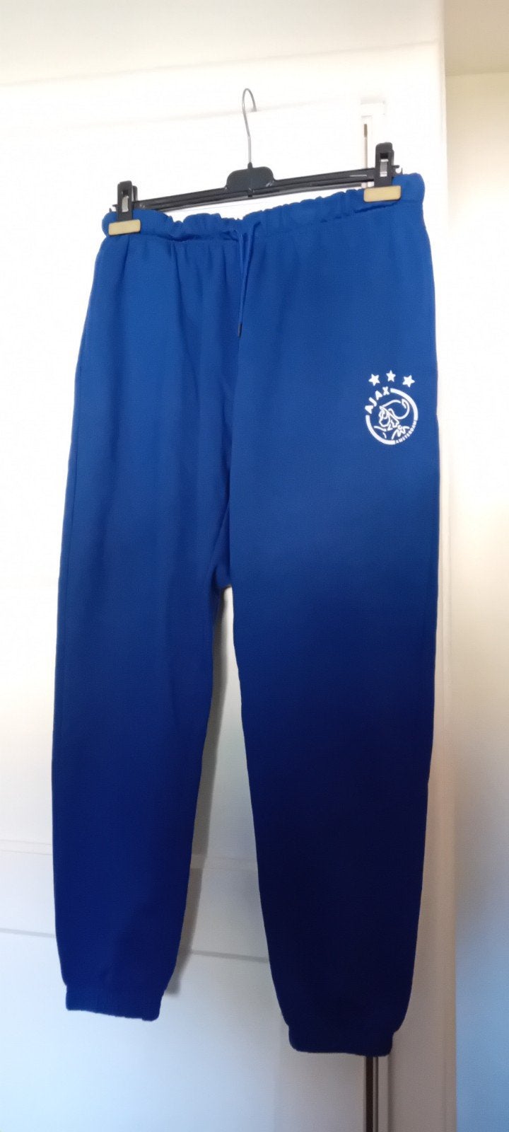 joggingbroek ajax licht blauw, Ophalen of Verzenden, Maat 48/50 (M), Blauw, Voetbal