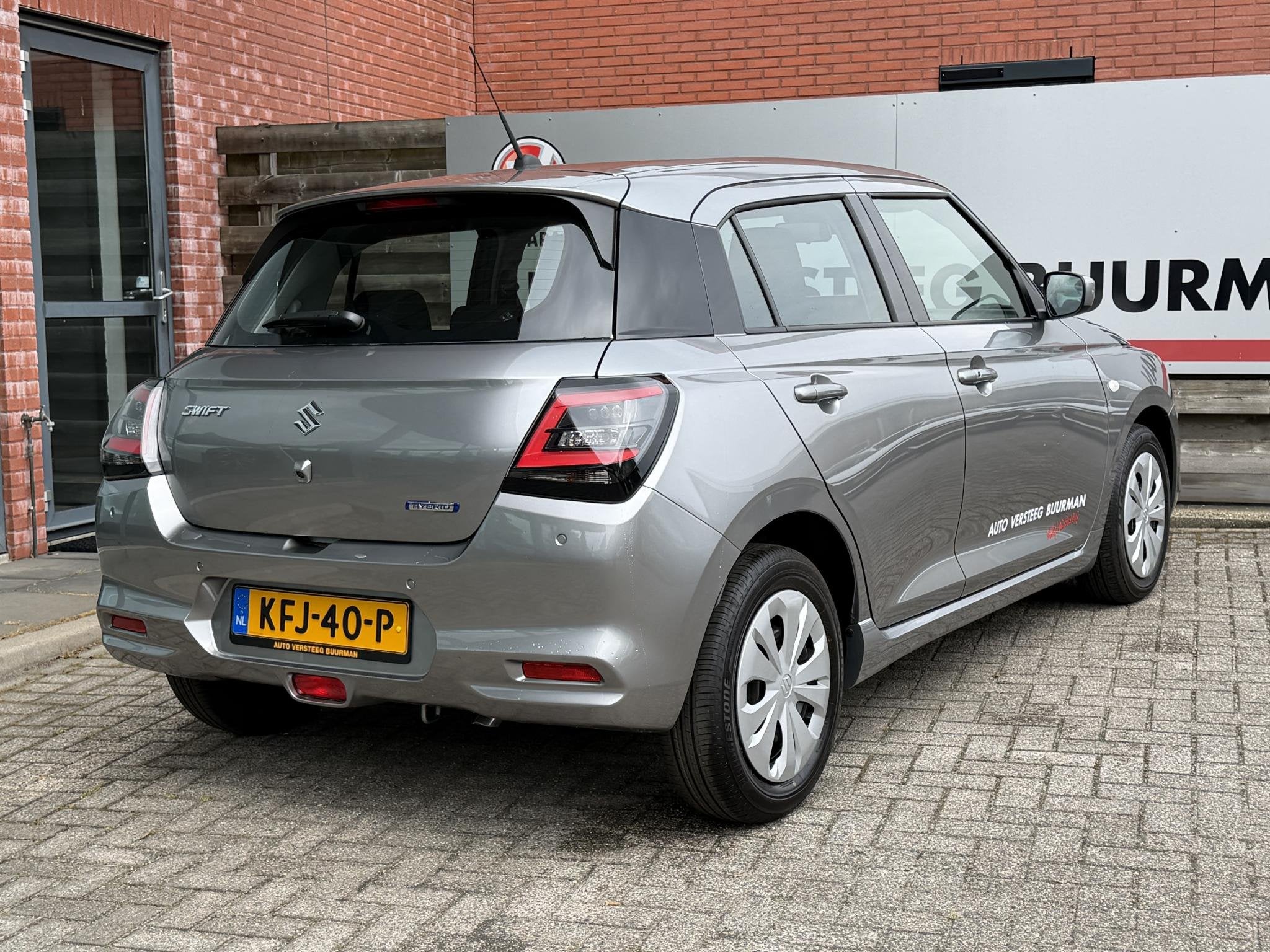 Suzuki Swift 1.2 Comfort Smart Hybrid DEMO DEAL, Achteruitri, Auto's, Suzuki, 12 maanden, Stof, Euro 6, Origineel Nederlands