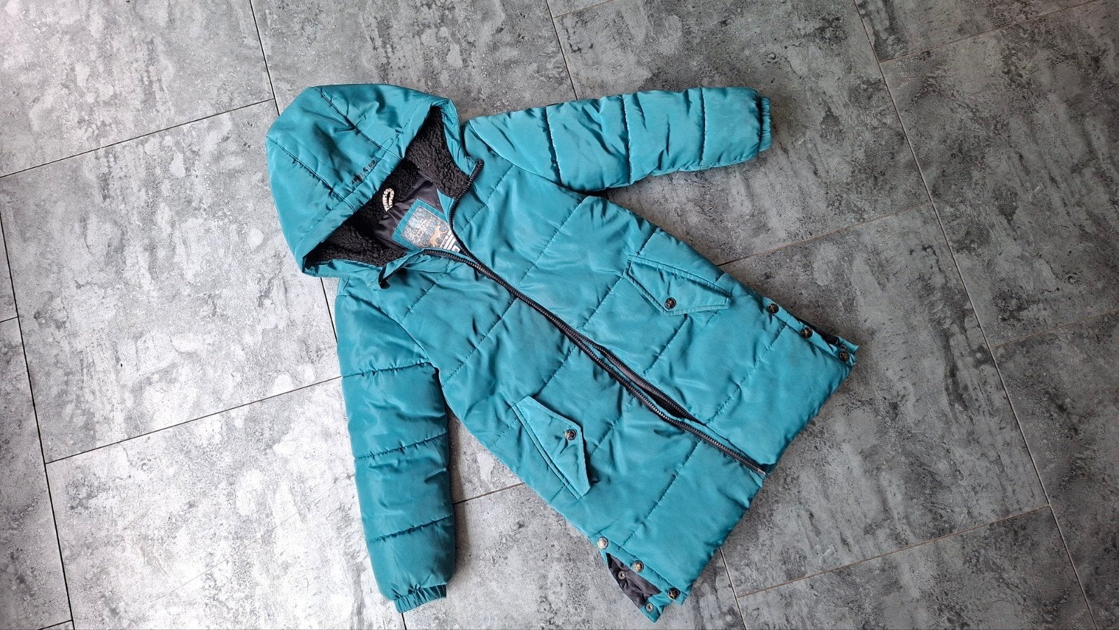 Winterjas gevoerd WE Fashion 122/128 kleur turquoise, Gebruikt, Meisje, Ophalen of Verzenden, Jasje