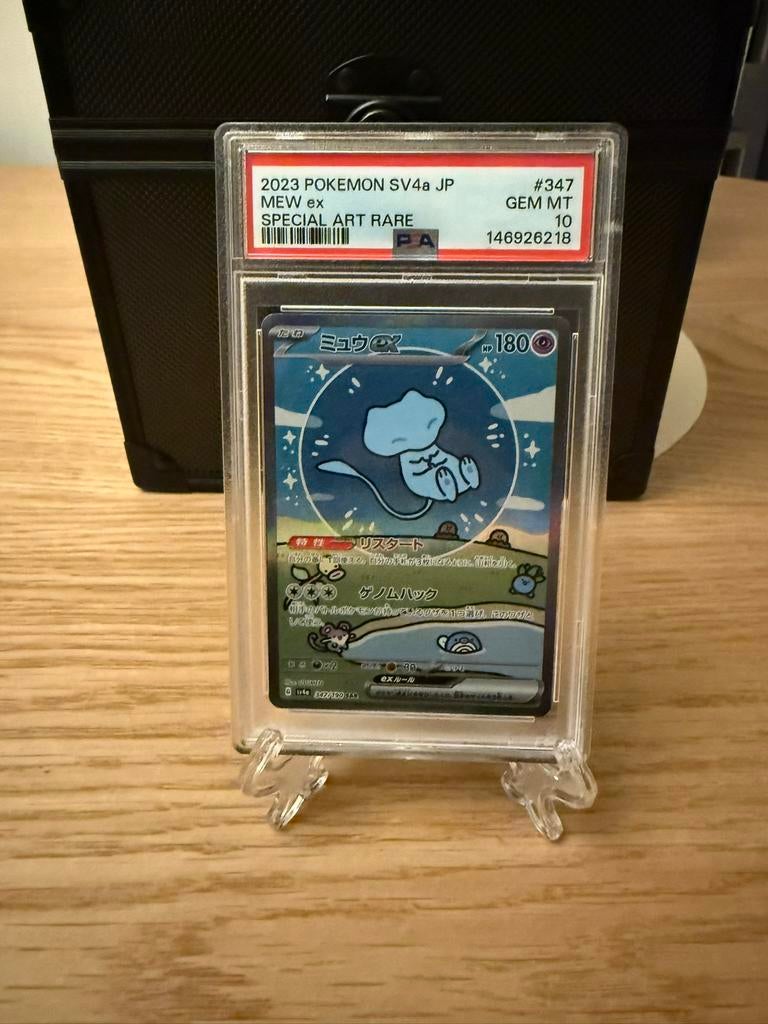 Bubble mew, umbreon en charizards psa 10 slabs