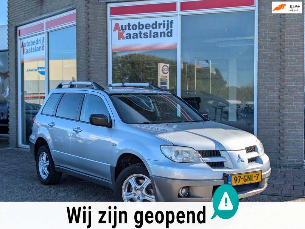 Mitsubishi Outlander Sport 2.0 Travel - Airco - Trekhaak - A, Auto's, Mitsubishi, Voorwielaandrijving, Zwart, 4 cilinders, 1415 kg