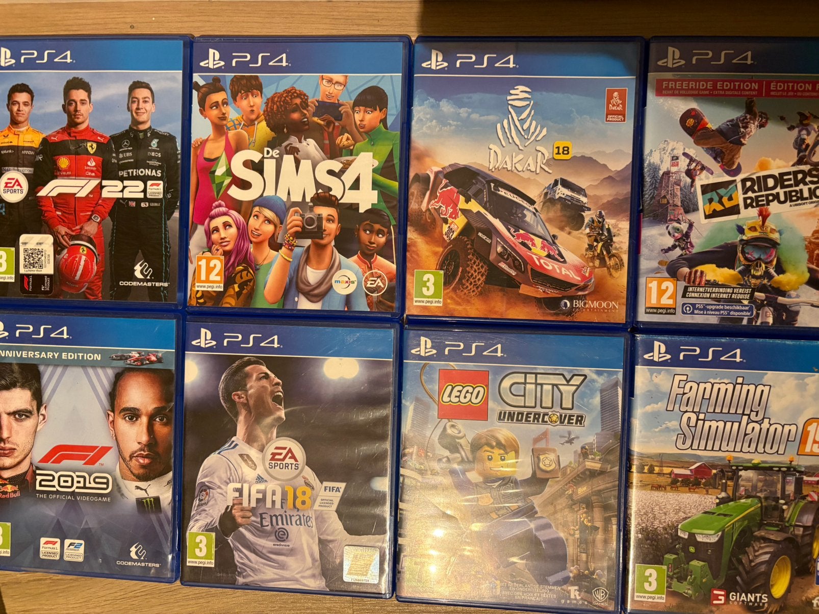 8 PS4 games – F1, FIFA, LEGO, Sims 4, Farming Simulator meer, Online, Gebruikt, Ophalen of Verzenden, Sport