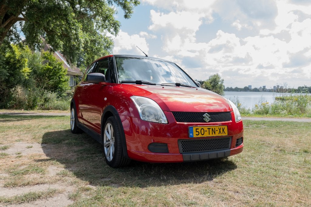 Suzuki Swift 1.3 3D 2006 Rood met zwart dak, Auto's, Suzuki, 945 kg, Swift, Origineel Nederlands, Handgeschakeld