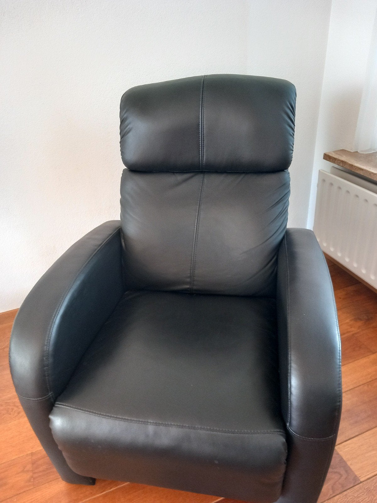 Zwarte leren relaxfauteuil met voetensteun