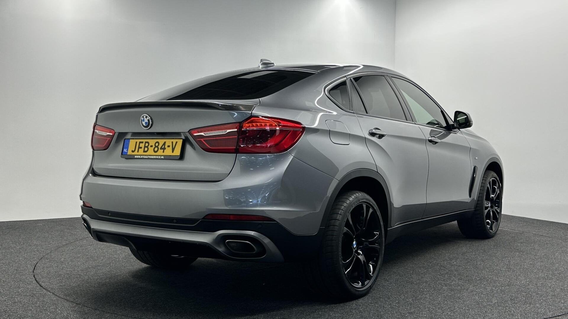 BMW X6 xDrive40d High Executive LEER NAVI CAMERA SCHUIF/OPEN, Auto's, Gebruikt, 2993 cc, Met garantie (alle), 4 stoelen
