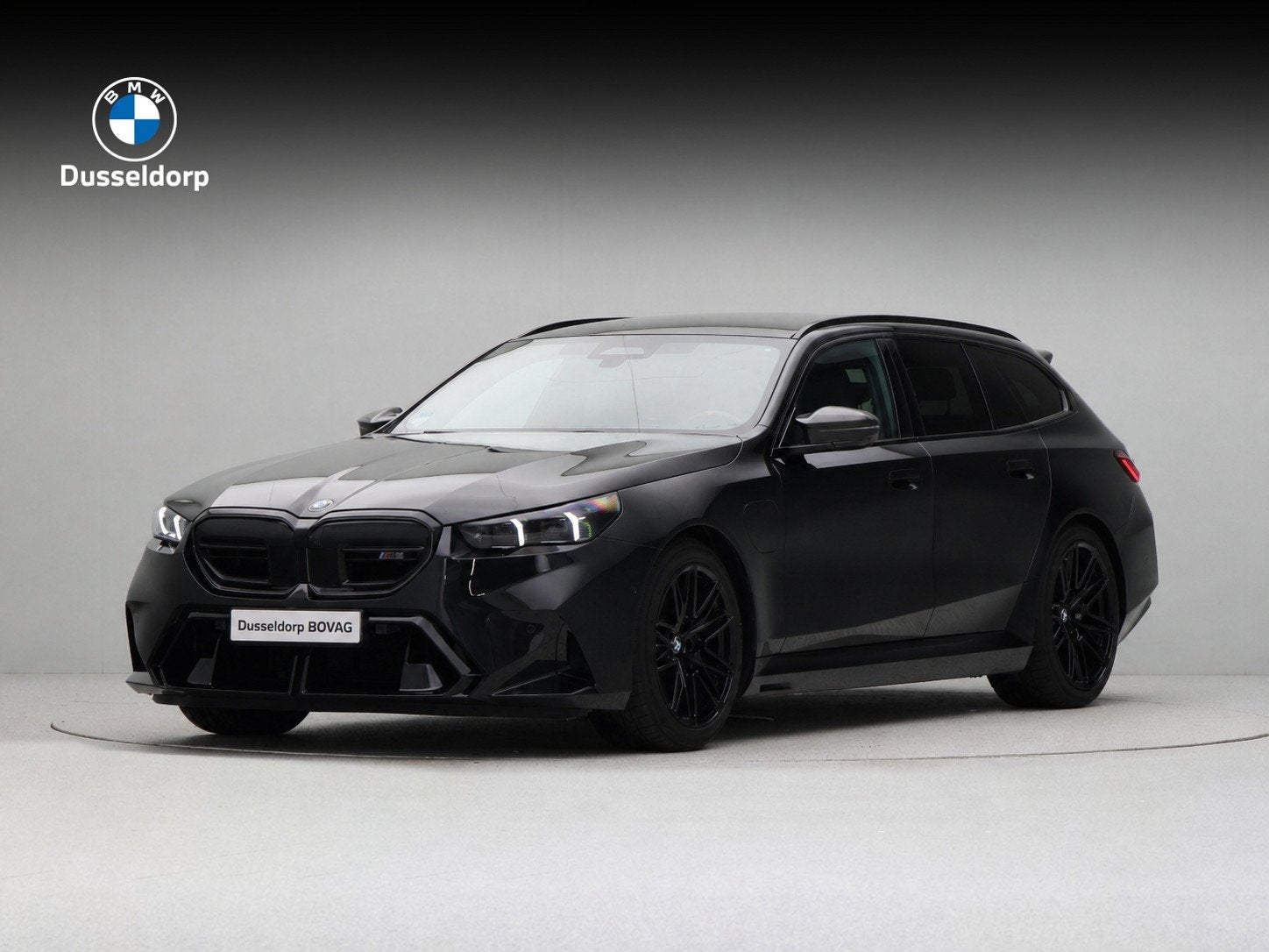 BMW M5 Touring (bj 2026, automaat), Auto's, Gebruikt, 4395 cc, Overige brandstoffen, Zwart