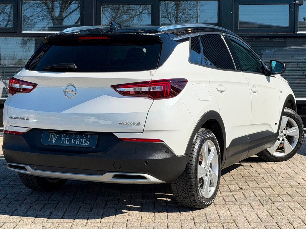 Opel Grandland X 1.6 Turbo Hybrid4 Ultimate 300pk Plug-in Fu, Auto's, Opel, Automaat, 77 km/l, Zwart, 4 cilinders