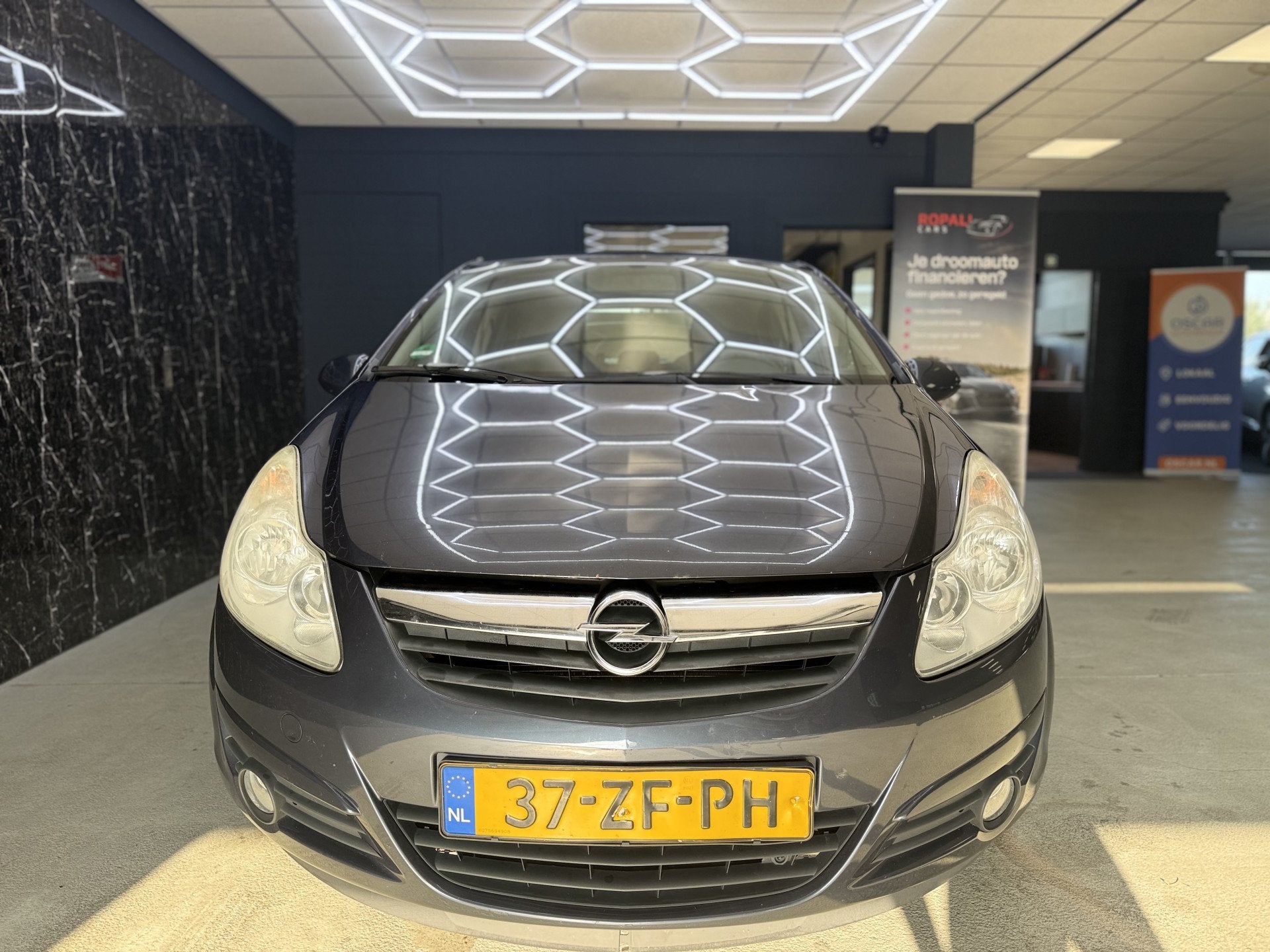 Opel Corsa 1.4-16V Enjoy (bj 2008), Auto's, Voorwielaandrijving, Gebruikt, Zwart, 4 cilinders
