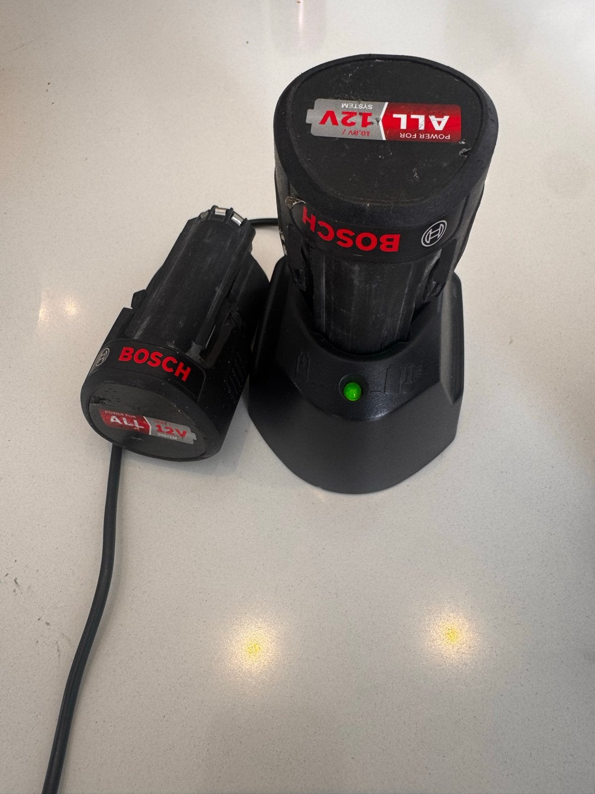 2 Bosch 12V accu's met lader - Power for ALL systeem, Ophalen of Verzenden, Gebruikt