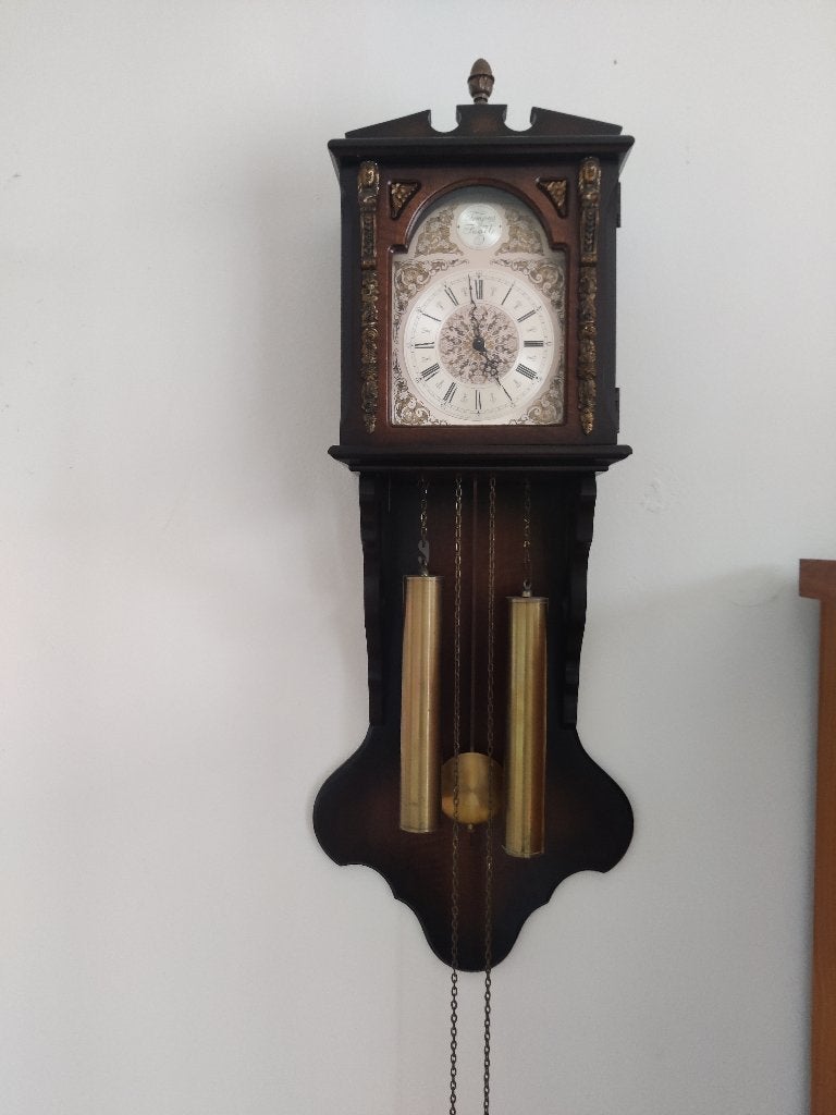 Antieke wandklok Tempus Fugit, Ophalen