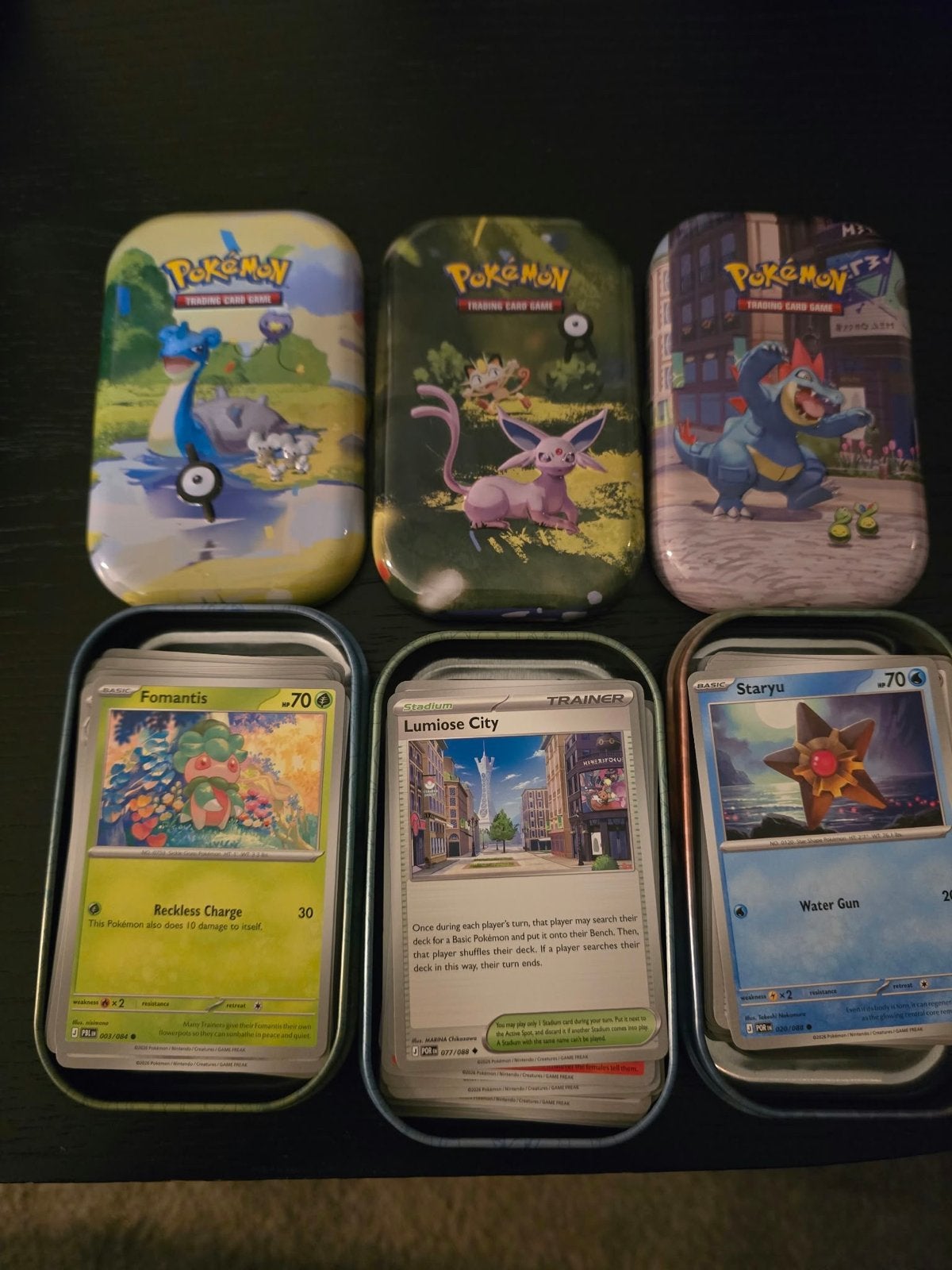 248 pokemon  kaarten (Pitch Black set) + mini tins, Ophalen of Verzenden, Gebruikt, Meerdere kaarten