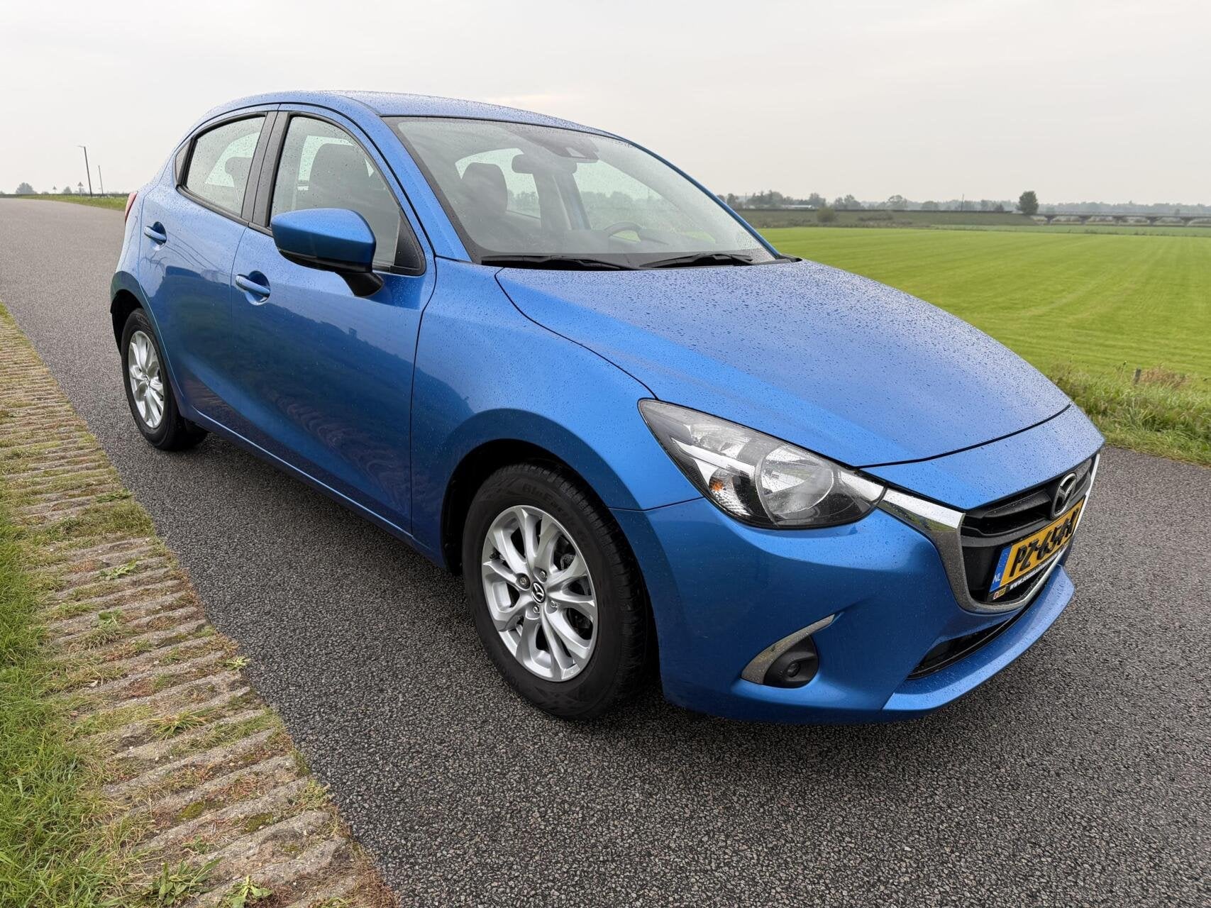 Mazda 2 1.5 Skyactiv-G Dynamic AIRCO LMV CRUISE NAV DEALER O, Auto's, Voorwielaandrijving, Gebruikt, 4 cilinders, Met garantie (alle)