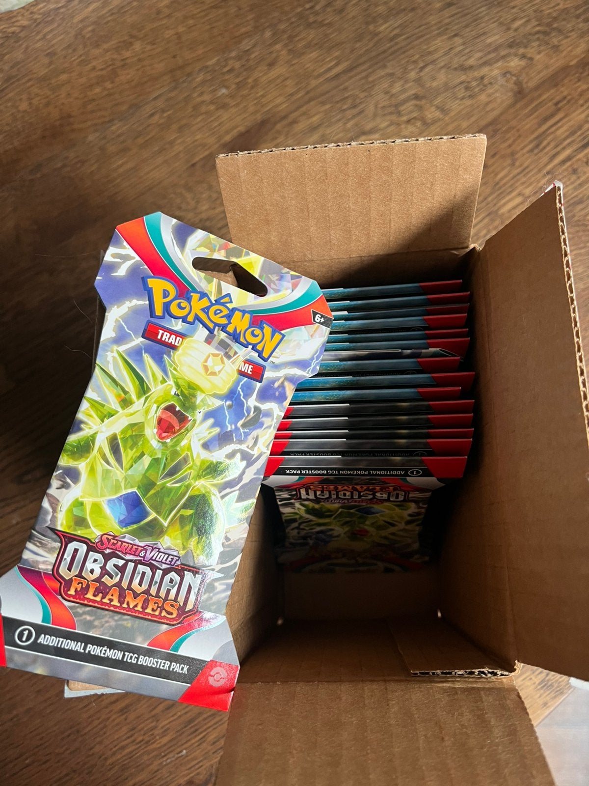 16x obsidian flames sleeved booster packs, Ophalen of Verzenden, Zo goed als nieuw, Booster