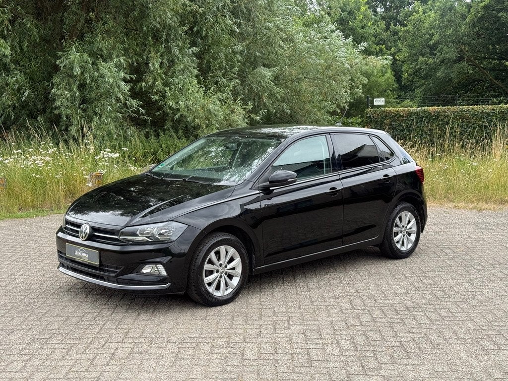 Volkswagen Polo 1.0 TSI Highline DSG I NAVI I CARPLAY I EERS, Gebruikt, Automatische klimaatregeling, 116 pk, Zwart