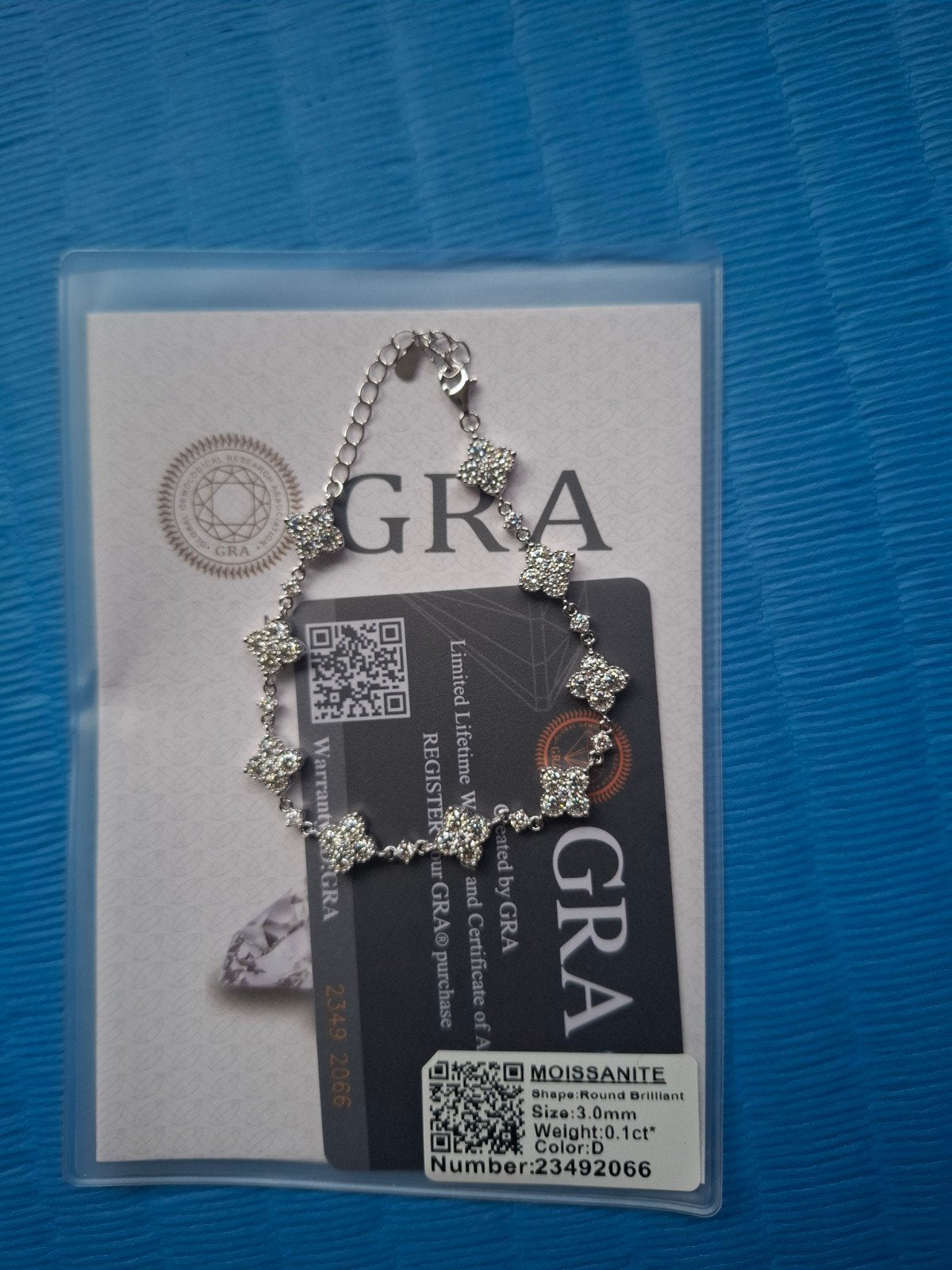 Moissanite Klavertje Vier Armband met GRA Certificaat, Staal, Ophalen of Verzenden, Zo goed als nieuw, Met edelsteen