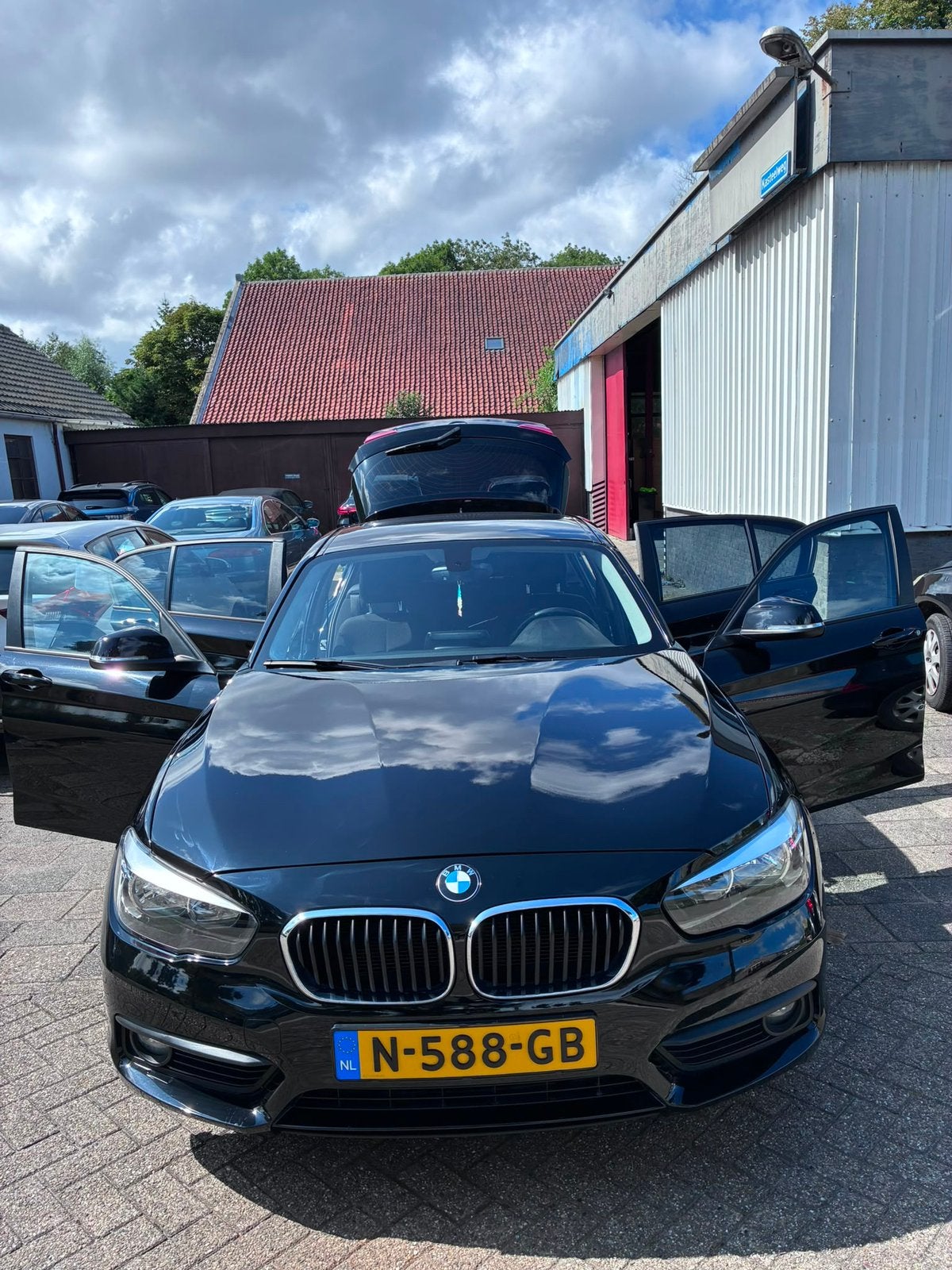 BMW 1-Serie 118i 136pk Aut 2018 Zwart, Auto's, BMW, 1295 kg, Zwart, 650 kg, Particulier