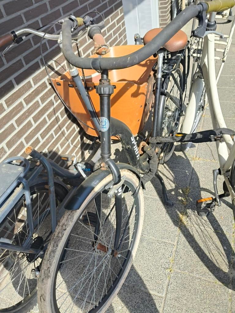 Moeder fiets met wat werk, Ophalen
