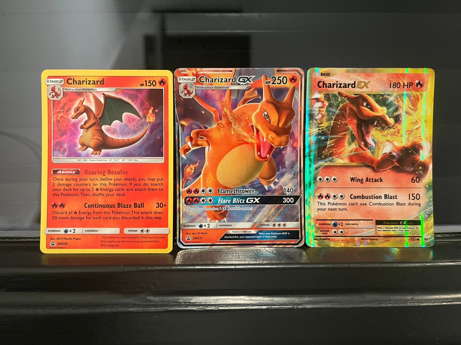 Setje charizard kaarten., Ophalen of Verzenden, Zo goed als nieuw, Meerdere kaarten, Foil