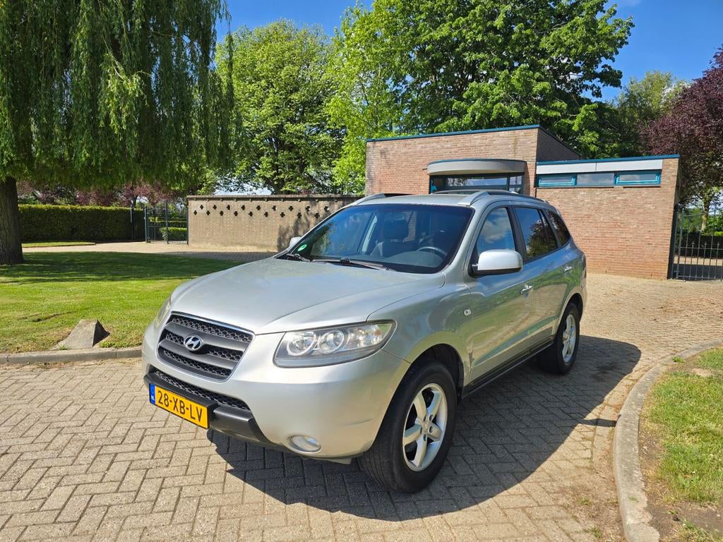Hyundai Santa Fe 2.7 | 7 persoons | Goed onderhouden | NAP !, Auto's, Voorwielaandrijving, Zwart, 2000 kg, Bedrijf