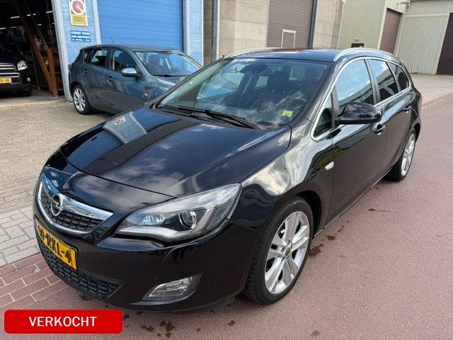 Opel Astra Sports Tourer 1.4 Turbo Sport Automaat 1e eigenaa, Auto's, Euro 5, 15 km/l, Gebruikt, Zwart