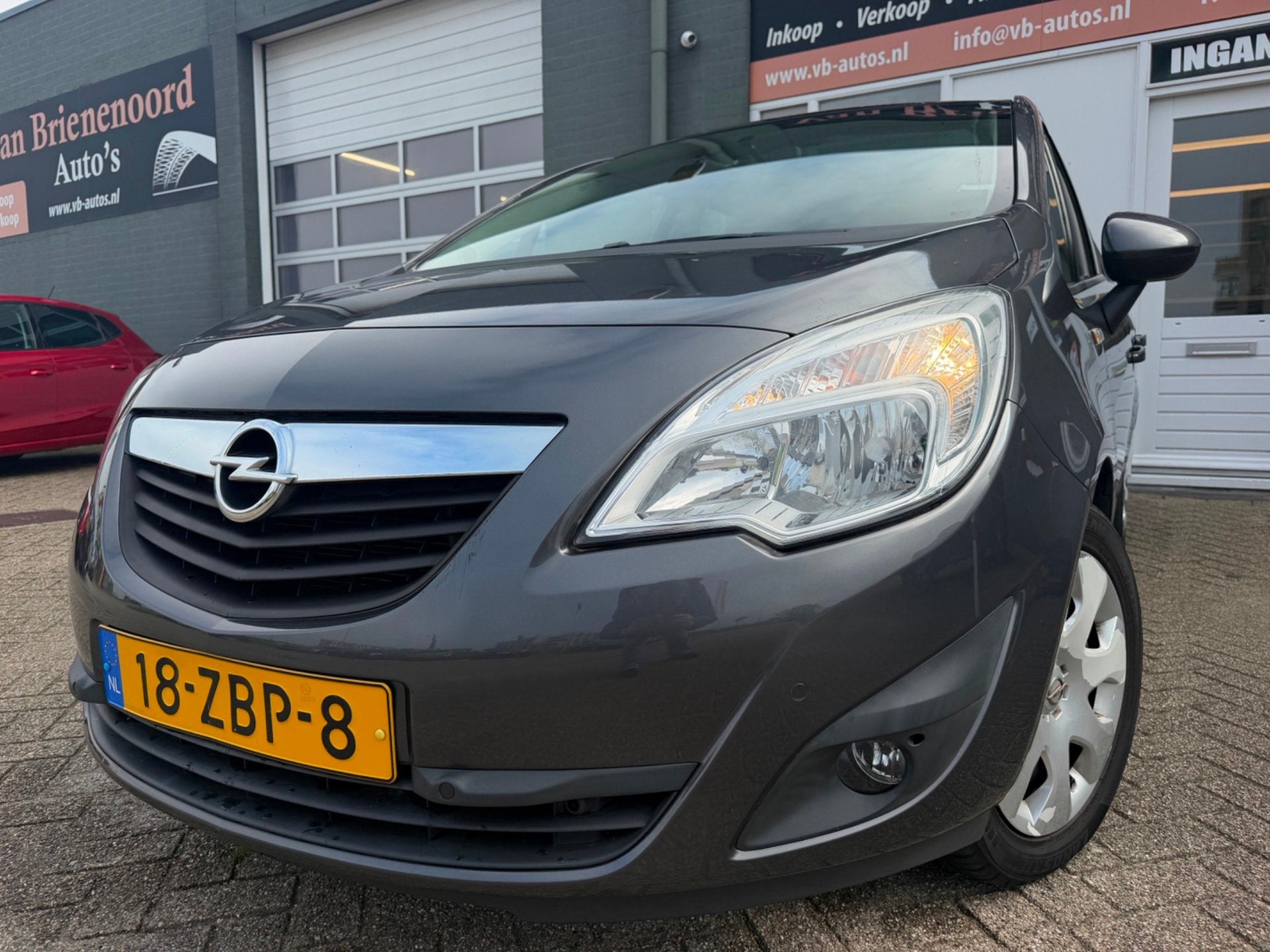 Opel Meriva 1.4 Turbo Cosmo van 2de Eig met trekhaak en park, Auto's, Voorwielaandrijving, Euro 5, Verwarmde buitenspiegels, Gebruikt