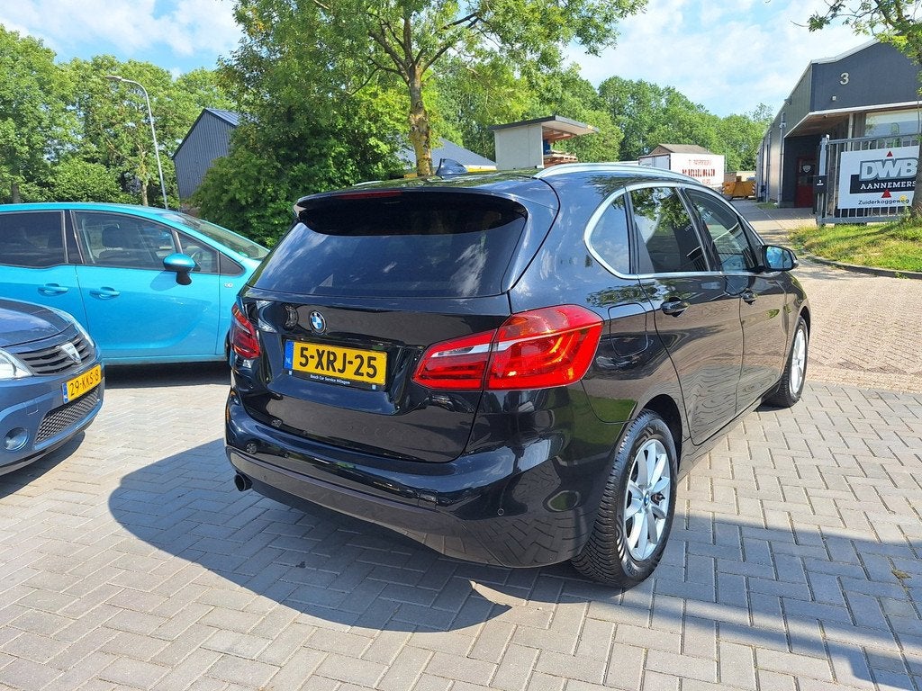 BMW 2-serie Active Tourer 218i Executive / Vol opties! / APK, Auto's, BMW, Voorwielaandrijving, 136 pk, Gebruikt, Zwart